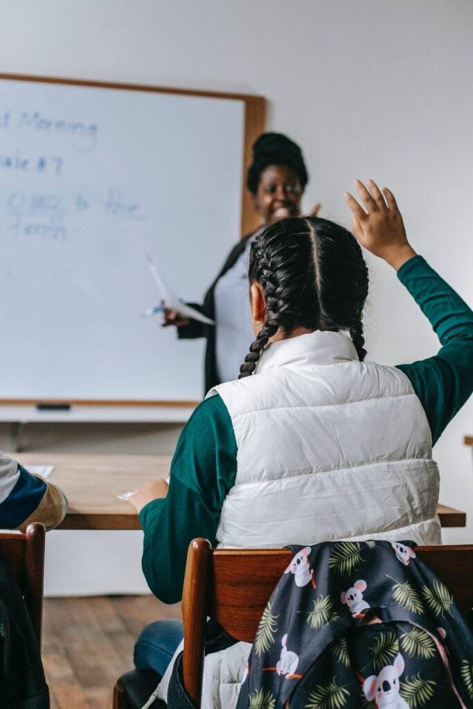 Student Raising hand in STEM class | Avatar Learning Center | STEM Education Online