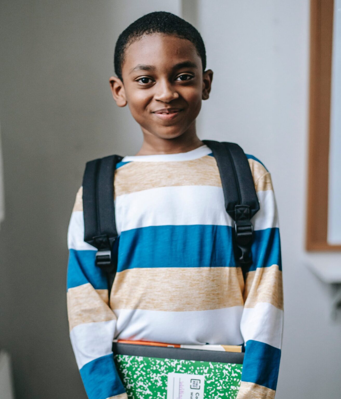 Child wearing school bag | About us | Avatar Learning Center | Online STEM Tutoring